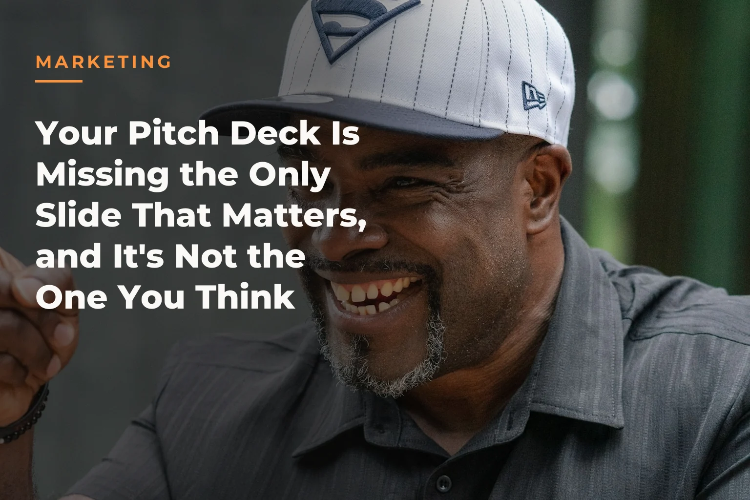 Atiba de Souza wearing a dark-colored shirt and a white baseball cap with a blue Superman logo on the front. The cover reads: MARKETING Your Pitch Deck Is Missing the Only Slide That Matters, and It's Not the One You Think