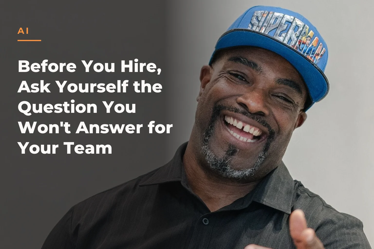 Atiba de Souza sitting on a set of stairs, smiling and gesturing with his hands. The cover reads: AI Before You Hire, Ask Yourself the Question You Won't Answer for Your Team