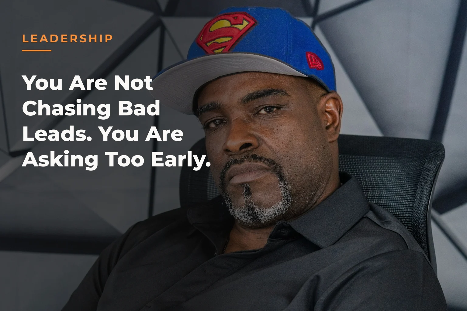 Atiba de Souza sitting in a black office chair with his arms crossed and hands resting on his stomach. The cover reads: LEADERSHIP You Are Not Chasing Bad Leads. You Are Asking Too Early.